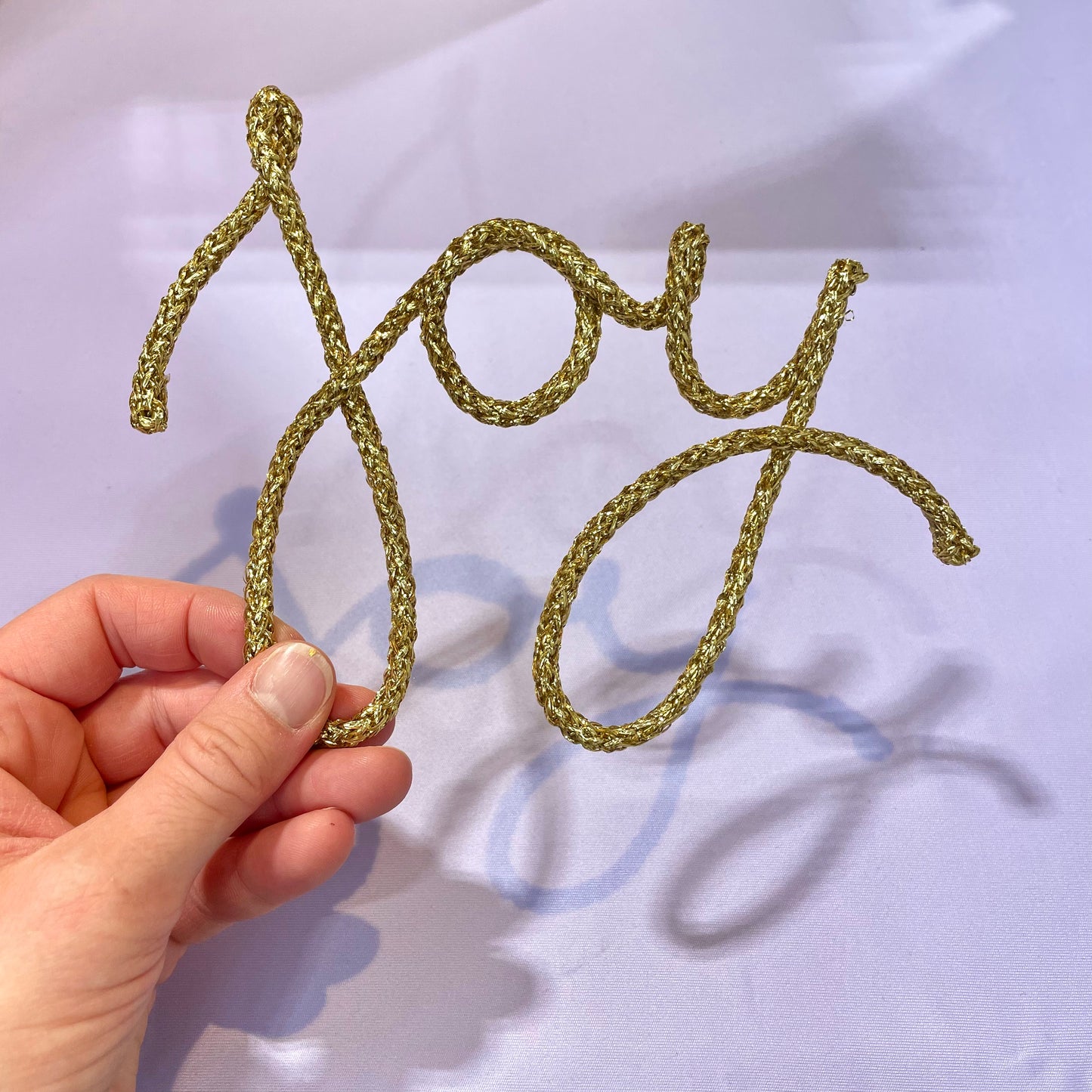 "joy" en tricotin